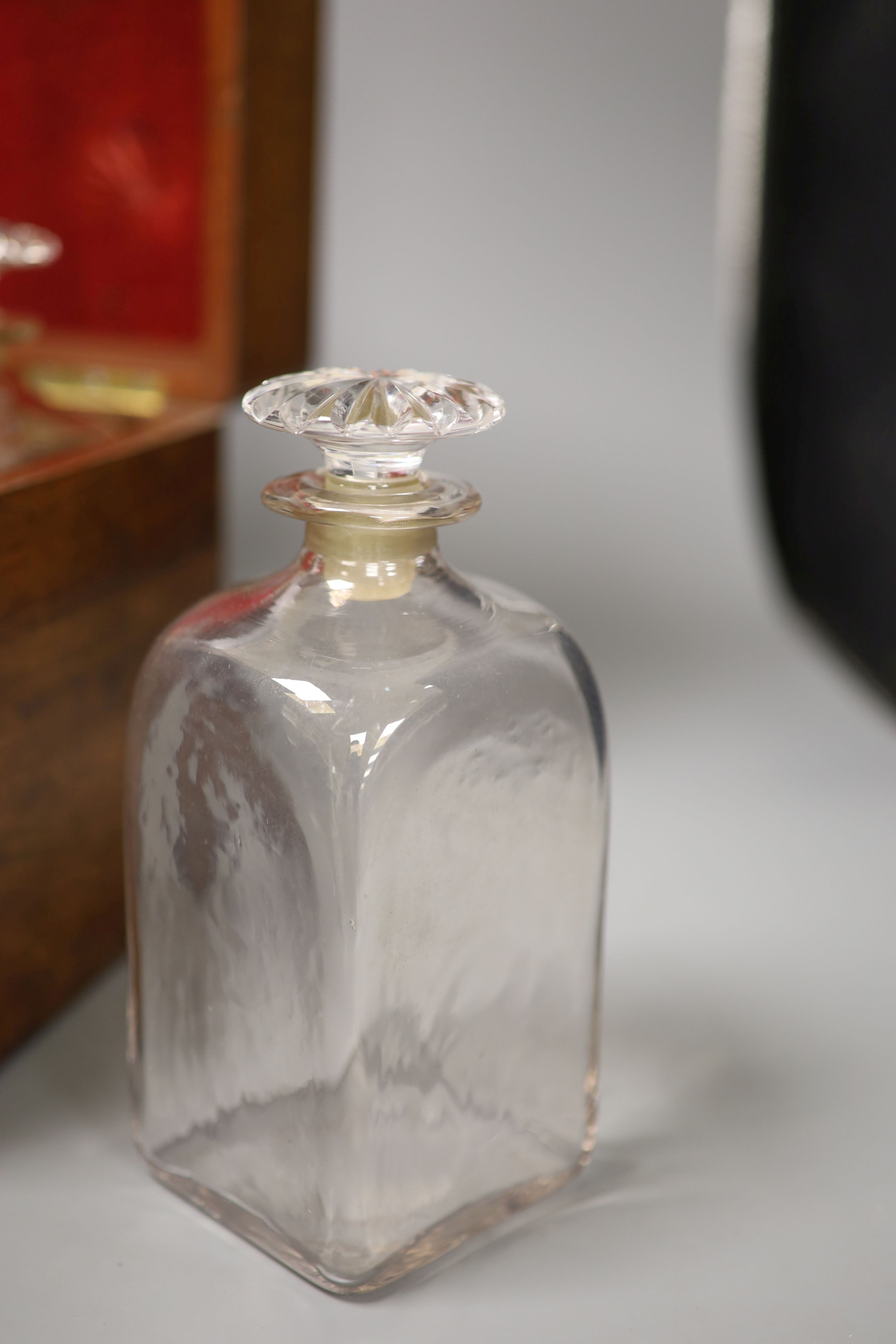 A mahogany cased decanter box and three decanters, height 23cm